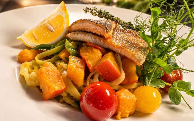 Lachsforelle Kuerbis Pasta im Restaurant Neander